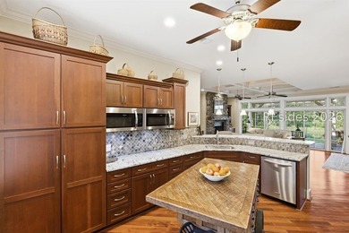 Tucked into a serene waterfront setting where towering trees - photo 17