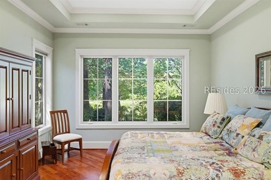 Tucked into a serene waterfront setting where towering trees - photo 27