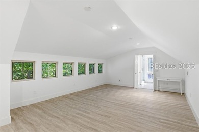 Tucked into a serene waterfront setting where towering trees - photo 36