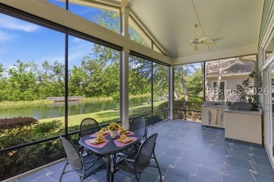 Tucked into a serene waterfront setting where towering trees - photo 40