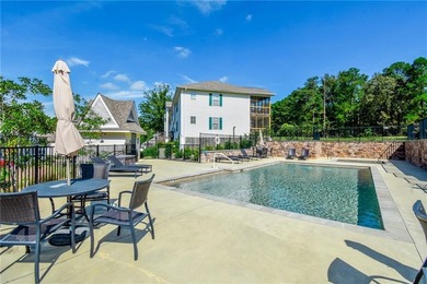 This inviting 2 bedroom, 2 bath condo is located inside the - photo 2