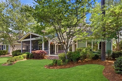 Tucked into a serene waterfront setting where towering trees - photo 45