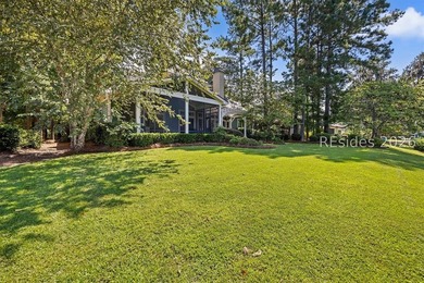 Tucked into a serene waterfront setting where towering trees - photo 46