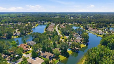 Tucked into a serene waterfront setting where towering trees - photo 49