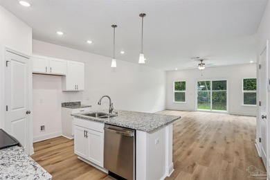 NEW CONSTRUCTION | MOVE-IN READY Step into low-maintenance - photo 3