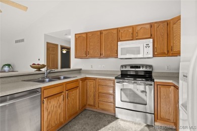 Tucked away on the quiet side of the lake, this freshly painted