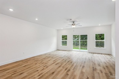 NEW CONSTRUCTION | MOVE-IN READY Step into low-maintenance - photo 8