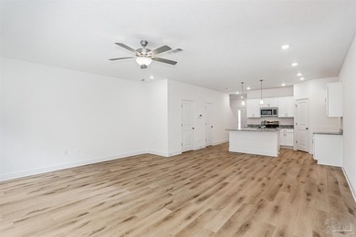 NEW CONSTRUCTION | MOVE-IN READY Step into low-maintenance - photo 10