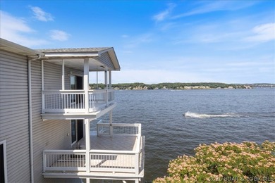 Perched above the shimmering waters of the Lake of the Ozarks - photo 12
