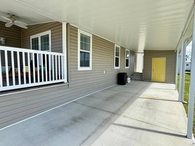 This 2018 home features 3 bedrooms, 2 baths, and a charming - photo 3