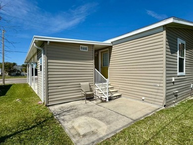 This 2018 home features 3 bedrooms, 2 baths, and a charming - photo 4
