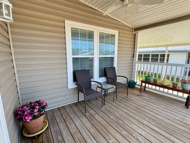 This 2018 home features 3 bedrooms, 2 baths, and a charming - photo 5