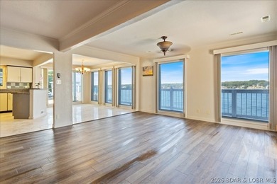 Perched above the shimmering waters of the Lake of the Ozarks - photo 25