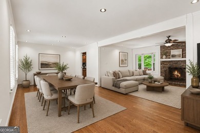This charming split-level home with a rocking chair front porch - photo 5