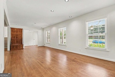 This charming split-level home with a rocking chair front porch - photo 7