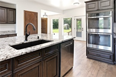 Wake up to beautiful views of Lake Tenkiller from the comfort of - photo 15