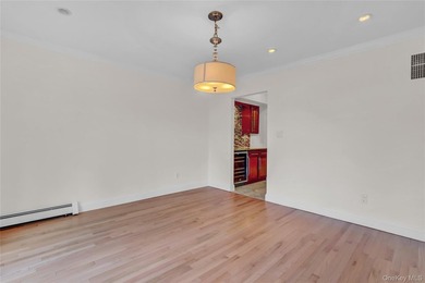 Set on nearly an acre in the heart of Miller Place, this - photo 4