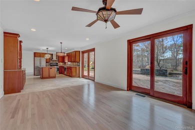 Set on nearly an acre in the heart of Miller Place, this - photo 9