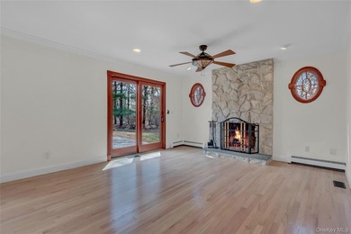 Set on nearly an acre in the heart of Miller Place, this - photo 10