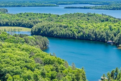 Enjoy the best of Northwoods lake living on the sought-after - photo 45