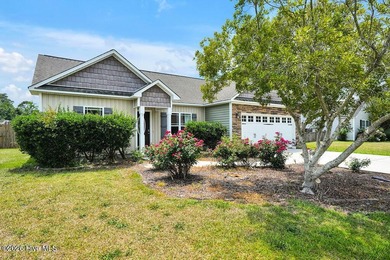 Welcome to this charming 3-bedroom, 2-bathroom home nestled in - photo 3