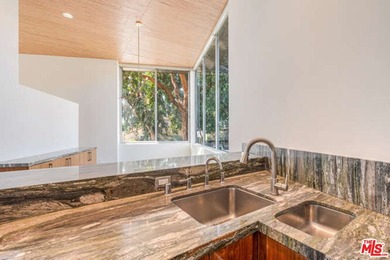 An architectural multi-unit compound centrally located in the - photo 12