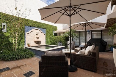 Reminiscent Of Homes In San Antonio, This Exquisite Townhome - photo 40