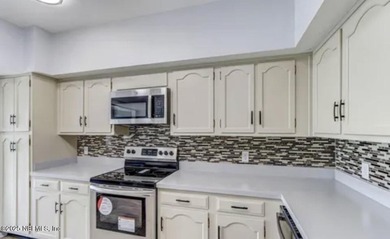 Welcome to this charming condominium located on San Jose Blvd in - photo 11