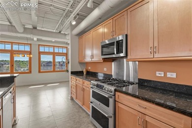 This rare penthouse corner residence in Poet Lofts, offers an - photo 12