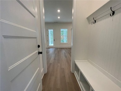 Stunning 2-story home with a 3rd car garage in a coveted