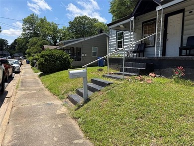 2 Bedroom, 1 Bath small home with kitchen, laundry space, front - photo 3