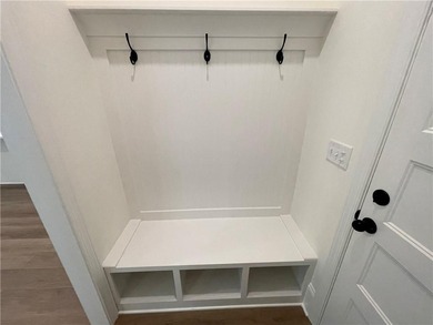 Stunning 2-story home with a 3rd car garage in a coveted