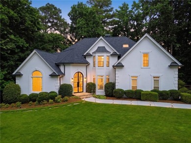 Nestled in a quiet cul-de-sac in the highly desirable, upscale - photo 2