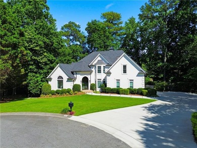 Nestled in a quiet cul-de-sac in the highly desirable, upscale - photo 3