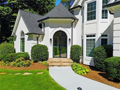 Nestled in a quiet cul-de-sac in the highly desirable, upscale - photo 5