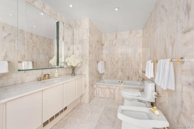 Located at the prime corner of 80th Street and Madison Avenue - photo 6