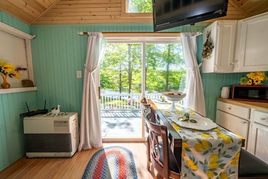 Discover a delightful year-round retreat with 100 feet of - photo 12