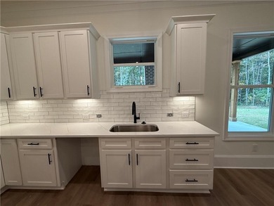 Stunning 2-story home with a 3rd car garage in a coveted