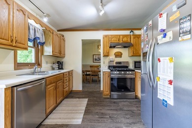 FISH, BOAT, GOLF AND VACATION AT HOME IN THIS SPACIOUS QUAD - photo 15