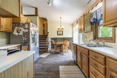 FISH, BOAT, GOLF AND VACATION AT HOME IN THIS SPACIOUS QUAD - photo 16