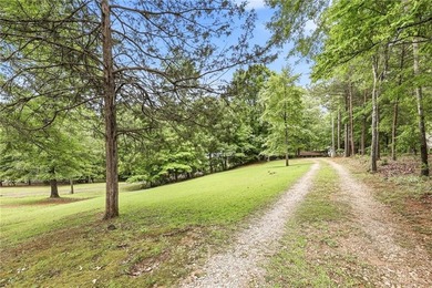 Discover a generational opportunity at 7726 Sourwood Ln in - photo 8