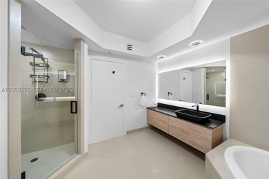 A masterfully reimagined beachfront residence offered turnkey - photo 22