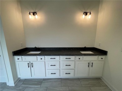 Stunning 2-story home with a 3rd car garage in a coveted