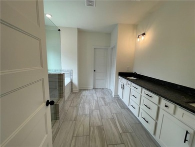 Stunning 2-story home with a 3rd car garage in a coveted