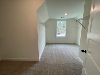 Stunning 2-story home with a 3rd car garage in a coveted