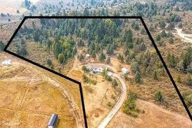 Step into wide-open country living in this well-maintained