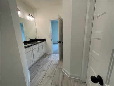 Stunning 2-story home with a 3rd car garage in a coveted