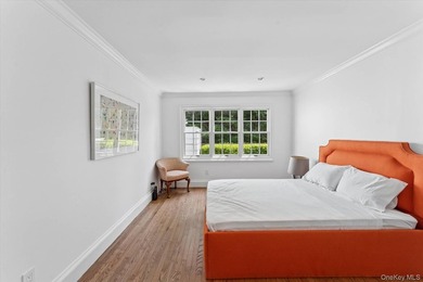 Set on a just-shy acre in the coveted estate section of - photo 17