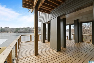 Nestled on the shores of Jordan Lake, this breathtaking 3,314 sq - photo 11