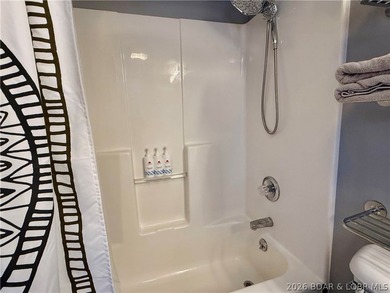 Lake life just got a serious glow-up! This beautifully remodeled - photo 32